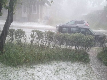 Hail pours down in front of Tracey Blaine's house