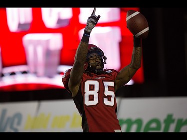 Stampeders wide receiver Joe West celebrates a touchdown during the first half as the Calgary Stampeders take on the Ottawa RedBlacks at McMahon Stadium in Calgary on August 15th, 2015.