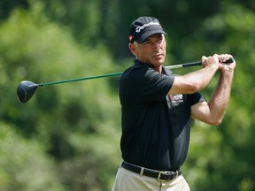 Corey Pavin, seen hitting a shot at May's Insperity Championship, is dealing with a kidney stone that almost caused him to withdraw from the Shaw Charity Classic. He's glad he didn't after a 65 on Friday.