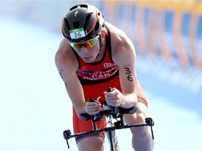 Calgary's Stefan Daniel competes in the cycling portion of the men's PT4 class during the Aquece Rio Paratriathlon at Copacabana beach on Saturday in Rio de Janeiro, Brazil.