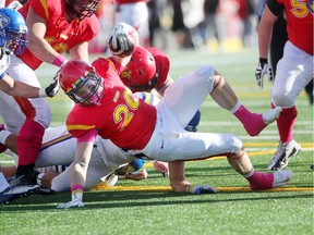 Dinos running back Mercer Timmis, seen scoring a touchdown against UBC last fall, ran for 276 yards against Manitoba on Friday night.