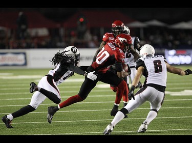 Stampeders wide receiver Eric Rogers runs the ball during the first half as the Calgary Stampeders take on the Ottawa RedBlacks at McMahon Stadium in Calgary on August 15th, 2015.