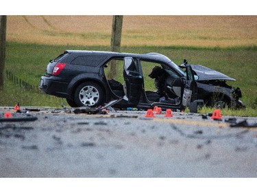 The scene of a two vehicle serious collision on 37th street south west and Highway 22X in Calgary on Saturday, Aug. 15, 2015. The occupants of the vehicles were extracted by emergency responders are transported to the Foothills hospital in serious condition.