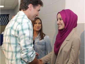 Ala Buzreba is seen talking with Liberal Leader Justin Trudeau. Buzreba stepped down as a Liberal candidate after controversial tweets surfaced. If someone didn't misspeak as a teen at least once, they should get on the Boring Bus with a one-way ticket, says Chris Nelson.