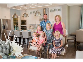 New Home buyers, Ryan and Marianne Delehay and their children Sarah, Elisha, Laura, Maria and Amelia in Drake Landing.