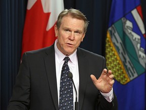 Dave Mowat, chair of Alberta's royalty review panel describes its mission during a news conference in Edmonton on August 28, 2015.