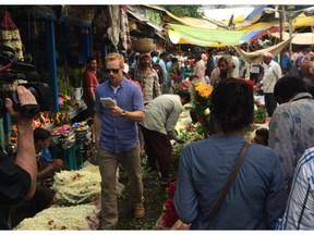 The Amazing Race Canada host Jon Montgomery runs his lines in the Mallick Ghat Flower Market in Kolkata, India.