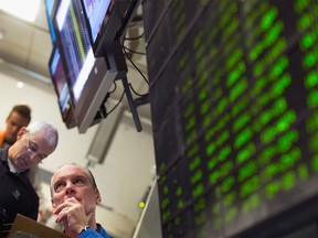 A trader monitors offers in the Standard & Poor's 500 stock index options pit at the Chicago Board Options Exchange (CBOE) on August 24, 2015 in Chicago, Illinois. Uncertainty among traders after big losses in the Asian markets caused a sharp drop in the S&P at the open.