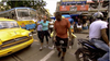 Simi and Ope navigate the streets of Kolkata during a Detour task on The Amazing Race Canada.