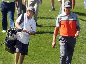 Calgary's Campbell Laidlaw, 16, caddied for Champions Tour golfer Bob Tway at the whole Shaw Charity Classic at the Canyon Meadows Golf and Country Club on Sunday, Aug. 9, 2015.