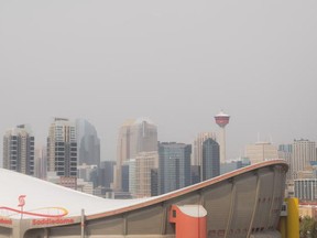 Smoke from forest fires in the Pacific Northwest blankets Calgary from ENMAX park on Monday, Aug. 24, 2015.