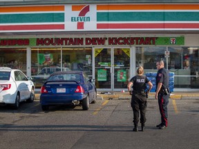 Police continue to investigate a stabbing outside a 7-Eleven at the intersection of McKnight Blvd and Centre Street North.