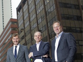 Steven Butt, centre, president of Avenue Commercial, with associates, Brendan Weekes, left, and Jeff Hopper, in front of a redevelopment site.