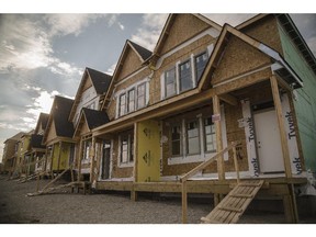 New home construction in the community of Auburn Bay in Calgary.