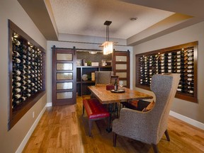 This wine room allows for storage and tastings in the Carrara home by Albi Homes.