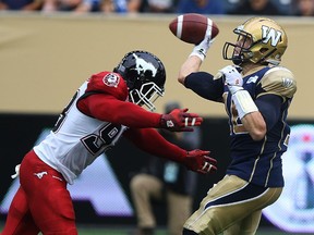 Calgary Stampeders defensive lineman Brandon Boudreaux had Winnipeg Blue Bombers quarterback Robert Marve on the run during Saturdays game.