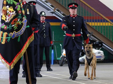 Constable Will Glover attends his k9 partner Marco's grad from the K9 Unit training in Calgary.