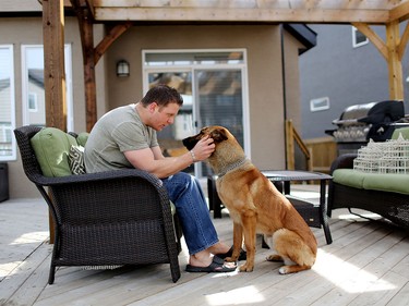 Constable Will Glover and his k9 dog Marco at their home in Calgary.