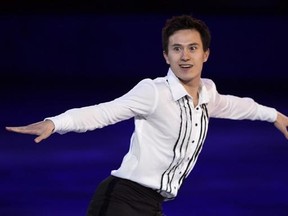 Men&#039;s silver medallist Patrick Chan performs in the figure skating closing gala at the Sochi Winter Olympics Saturday, February 22, 2014 in Sochi. Chan was back with Canada&#039;s figure skating team for the first time in more than year Wednesday. THE CANADIAN PRESS/Paul Chiasson
