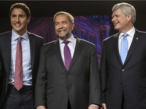 Liberal Leader Justin Trudeau, New Democratic Leader Thomas Mulcair and Conservative Leader Stephen Harper meet before the Calgary debate on Sept. 17.