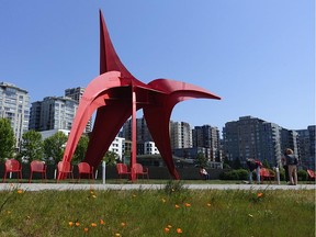 Public art in Seattle that includes seating to enjoy and participate in it.