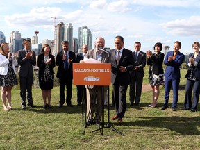 Finance Minister Joe Ceci endorses Bob Hawkesworth, the NDP candidate in the Calgary-Foothills byelection, in Calgary on September 1.