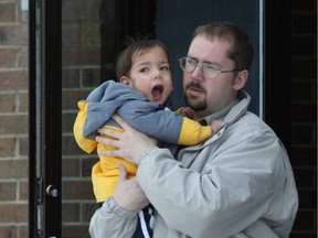 Duane Redelback leaves the memorial service of his common-law wife, Ruth Degayo.