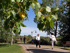 Calgarians enjoy the beautiful weather along the Glenmore Reservoir in Calgary on September 1, 2015.