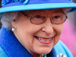 The Queen, seen attending a ceremony Wednesday in Scotland, is Britain's longest-serving monarch.