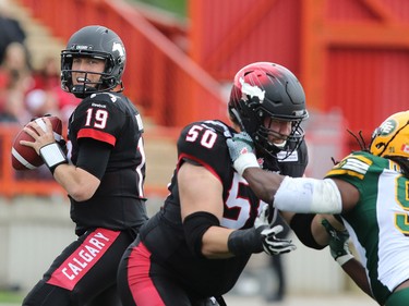 Calgary Stampeders quarterback Bo Levi Mitchell looks for a receiver during first half Labour Day Classic action at McMahon Stadium on Monday September 7, 2015.