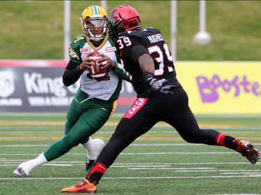 Charleston Hughes has Edmonton quarterback James Franklin in his sights during second half Labour Day Classic action at McMahon Stadium on Monday September 7, 2015. Calgary won the game 16-7.
