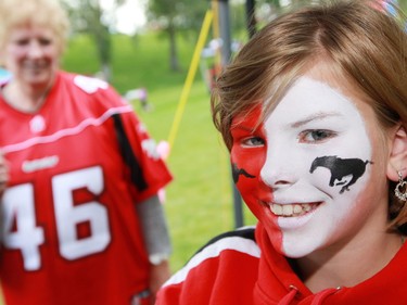 Alexandra Craig had her game face on as she celebrated her 10th birthday at the Labour Day Classic at McMahon Stadium. Alexandra's grandmother, Harolyn Long in the background, was a cheerleader for the Calgary Stampeders in 1964-65.