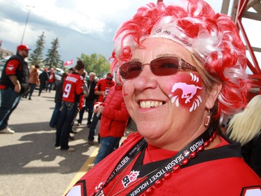Season ticket holder Cheryl Neufeld from Coaldale AB. was ready to cheer on her team at the Labour Day Classic at McMahon Stadium on Monday September 7, 2015.