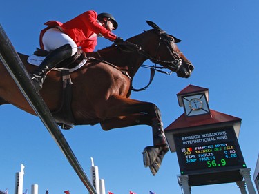 Belgium's Francois Mathy riding Polinska Des Isle competes during the $210,000 Tourmaline Oil Cup at the Spruce Meadows Masters on Friday September 11, 2015.