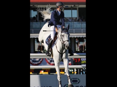 Peter Devos and Dylan from Belgium compete during the $210,000 Tourmaline Oil Cup at the Spruce Meadows Masters on Friday September 11, 2015.