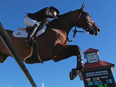 Canada's Tiffany Foster and Victor from compete during the $210,000 Tourmaline Oil Cup at the Spruce Meadows Masters on Friday September 11, 2015. Foster finished second in the event.