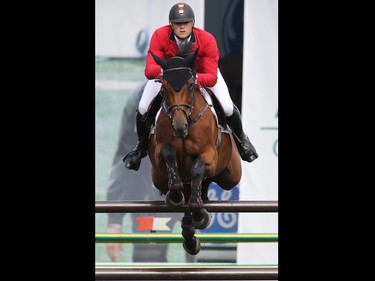 Belgian rider Francois Mathy on Polinska Des Isles competes in the jump off for the Akita Drilling Cup at the Spruce Meadows Masters on Wednesday September 9, 2015. Mathy finished 13th.