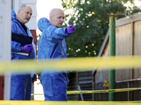 A Calgary police service forensics team continued their investigation at 4211 Centre St. North on Thursday morning the day after a man was found bleeding at the residence and later died in hospital.