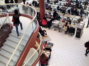Students move through and hang out in the busy MacEwan Hall at the University of Calgary on Nov. 7, 2013.