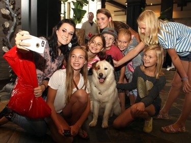 Mick the dog, who plays Stan in the Disney Channel hit show Dog with a Blog, causes a stir in the lobby when recognized by young fans at Hotel Arts. He was her with his trainers Guin Dill and Steve Solomon to shoot a promo for Disney's Canadian launch.