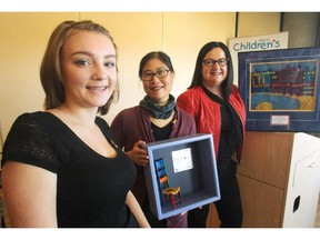 Cancer survivor Maddie Tutt, Kids Cancer Care Chair in Pediatric Oncology Dr. Jennifer Chan and Kids Cancer Care Founation of Alberta Founder and CEO Christine McIver were on hand for a gift ceremony by the Kids Cancer Care Foundation to the Alberta Children's Hospital Foundation on September 1, 2015. The gift totalled $1.25-million in support of the Childhood Cancer Research Program.