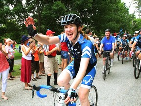 Canadian Olympic speed-skater and cyclist Clara Hughes acknowledges the crowd as she cycles with Governor General David Johnston   in Arnprior Ont., in the final stretch of her Big Ride, in June 2014. Reader says Hughes' fans haven't deserted her.