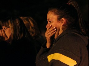 Family and friends of missing two-year-old Hailey Dunbar-Blanchette reacted at a candlelight vigil after being told the Amber Alert had been officially cancelled after human remains had been found on September 15, 2015.