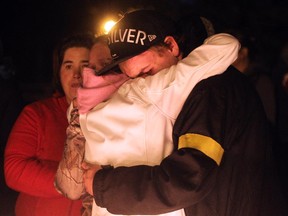 Family and friends of missing two-year-old Hailey Dunbar-Blanchette reacted at a candlelight vigil after being told the Amber Alert had been officially cancelled after human remains had been found on September 15, 2015.