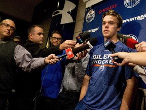 Connor McDavid speaks to media during a scrum at the Edmonton Oilers rookie camp in Edmonton on Thursday. He will go against the Flames youngsters on Saturday in Penticton, B.C.