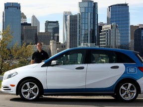 Jon Wycoco, general manager of car2go in Calgary with the new four-door model.
