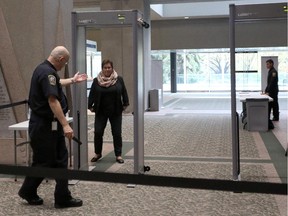 The public and most city staff members must now get any bags they are carrying searched before walking through a metal detector at Calgary City Hall.