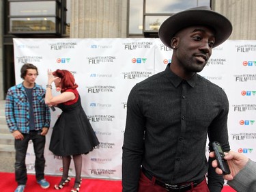 Wynonna Earp actor Shamier Anderson stopped to answer questions as he walked the red carpet at the opening gala night of the Calgary International Film Festival on September 23, 2015.