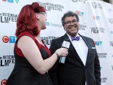 Mayor Naheed Nenshi stopped to be interviewed by Kim's Kitchen host Kim Hayden as he walked the red carpet at the opening gala night of the Calgary International Film Festival on September 23, 2015.