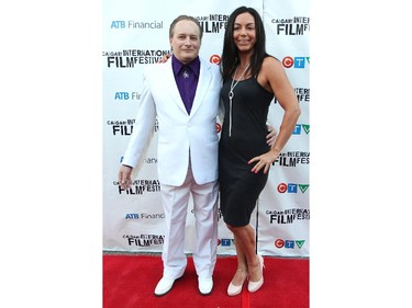 Phillip Liesemer got into the spirit of things as he and actress/model Niki Middleton walked the red carpet at the opening gala night of the Calgary International Film Festival on September 23, 2015.